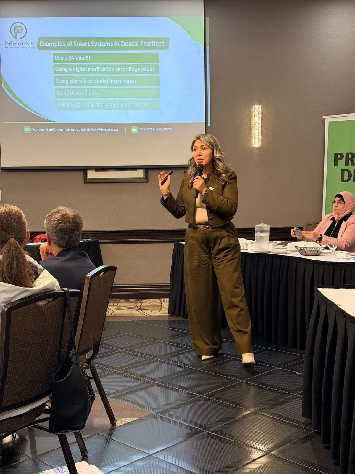 Reem Alayan presenting smart systems for dental practices to the Durham Ontario Dental Society, September 2026